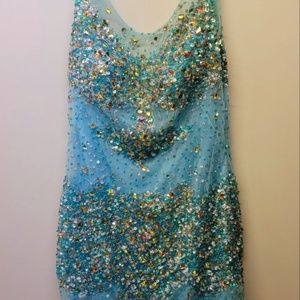 blue dress decorated with stones